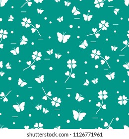 Seamless pattern with shamrock and butterflies. Saint Patrick's Day. Irish clover St. Patrick's.