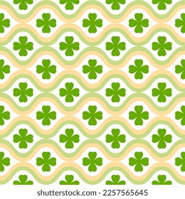 Seamless pattern of shamrock leaves and filed waves on isolated background. Design for St. Patrick’s day celebration, party decoration, scrapbooking, home decor, textile, print, paper crafts.