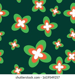 Seamless pattern with shamrock leaves and flowers. St Patrick's Day. Simple flat illustration. Green, white and orange. Irish colors. For post cards, wallpaper, textile and wrapping paper