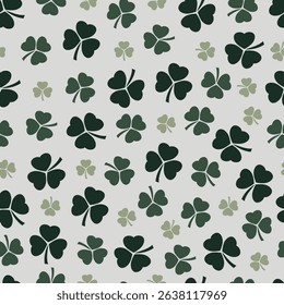 Seamless pattern with Shamrocks. Clover leaf hand-drawn doodle pattern vector illustration. St Patrick's Day symbol for textile, wallpaper, apparel, pajamas, card, wrapping, stationery.