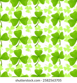 Seamless pattern of shamrocks of different sizes on white background for St. Patrick's Day