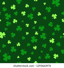 Seamless pattern with shamrocks in green colors. Saint Patrick's Day Holiday background. Vector.