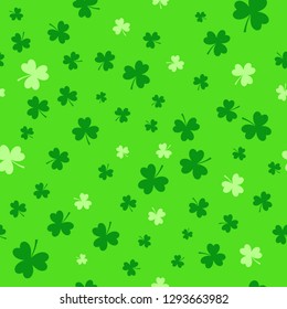 Seamless pattern with shamrocks in green colors. Saint Patrick's Day Holiday background. Vector.