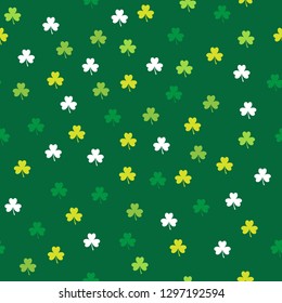 Seamless pattern with shamrocks in green colors. Saint Patrick's Day Holiday background. Vector.