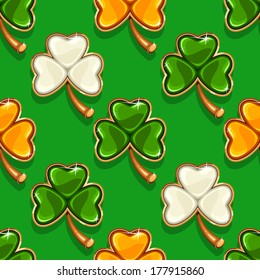 Seamless pattern with shamrocks in Irish flag color for St. Patrick's day