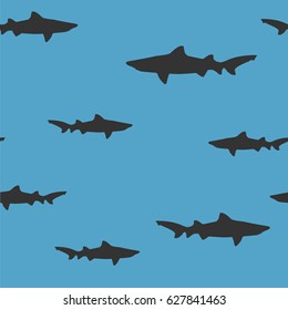 Seamless pattern with shark silhouette. vector illustration