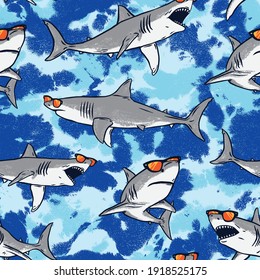 Seamless pattern of a sharks and tie dye with blue background elements 