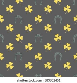 Seamless pattern with shining and glittering gold shamrocks clovers and pipes with horseshoes. Pattern for congratulations happy St. Patrick's day.  Seamless background eps