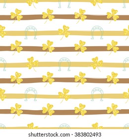 Seamless pattern with shining and glittering gold shamrocks clovers and horseshoes. Pattern for congratulations happy St. Patrick's day. Hand drawn background from strips. Seamless background eps