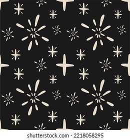 Seamless pattern with shining stars, sparkles on a dark background. Unique print in boh style. Ideal for fabric template, cover, wrapper or postcard.