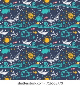 Seamless pattern with ships, fish, whales, starfish and sea waves. Drawn in a children's style.
