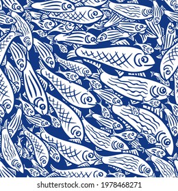 seamless pattern shoal of fish: 
white silhouettes on blue background, vector