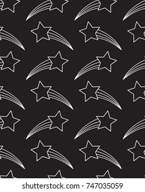Seamless pattern with shooting stars in black and white.