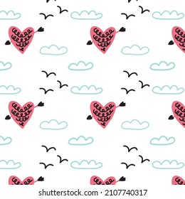 Seamless pattern shot heart with cupid's arrow in the sky. Valentine's Day digital paper wallpaper textile fabric repeat background