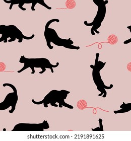 Seamless pattern with silhouette of animals. Cats with yarn ball. Pattern for paper, textile, wallpaper, etc. Vector illustration.