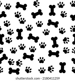 Seamless pattern silhouette black with bone and paw . Vector pattern