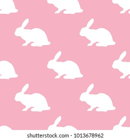 Seamless pattern with silhouette of bunny on pink background. Flat Design. Vector Illustration
