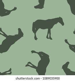 Seamless pattern. Silhouette of a horse.