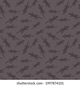 Seamless pattern, silhouette of lizards dark. Vector design, printing on fabric, clothes, covers, dishes, wallpaper and other products.