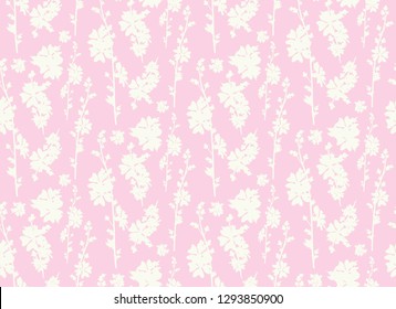 Seamless pattern with a silhouette of wildflowers isolated on pink