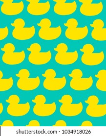 Seamless pattern with a silhouette of a yellow duck. Background on blue background for wrapping paper, backpack, clothes, fabric, textiles, wallpaper, socks, web, cards.