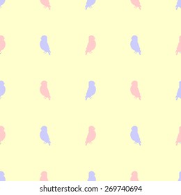 Seamless pattern with silhouettes of birds in different directions light yellow and pale purple and peach