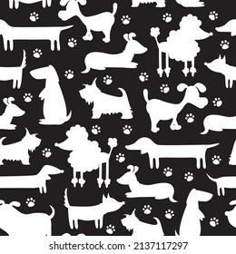 Seamless pattern with silhouettes of different dogs.