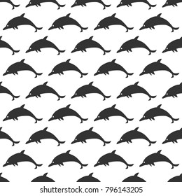 Seamless Pattern with silhouettes of dolphins. Repeating Pattern. Vector Illustration