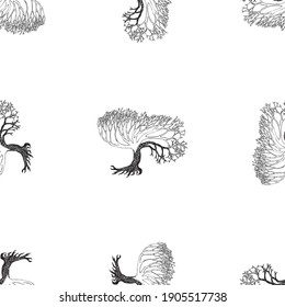 Seamless pattern of silhouettes drawn decorative  trees