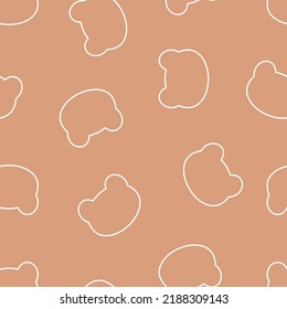 Seamless pattern from silhouettes of heads of bears. On a brown isolated background. Kawaii style.