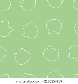 Seamless pattern from silhouettes of heads of frogs. On a green isolated background. Kawaii style.