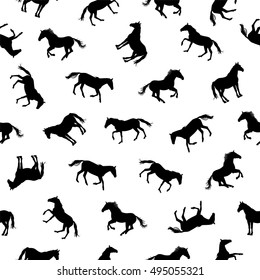 Seamless pattern - silhouettes of horses. Black on white