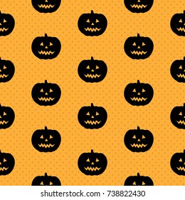 Seamless pattern with silhouettes of pumpkins. Halloween texture with black pumpkins on orange polka dots background. Good for wrapping paper, web page background, party invitation and greeting card.