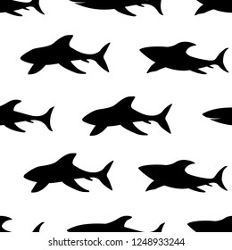 Seamless pattern with silhouettes of sharks. Australian animal. Isolated on white background. Black silhouettes. Hand drawn. Vector illustration.