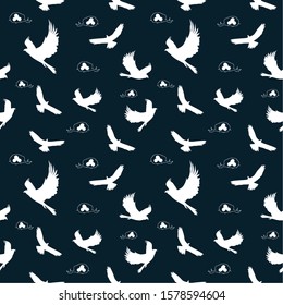 
Seamless pattern: silhouettes of white birds eagles and bird nests on a dark background. vector. illustration