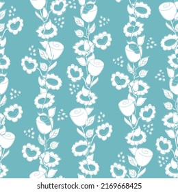 Seamless pattern of silhouettes of white flowers on a blue background. Floral female background. Vector illustration