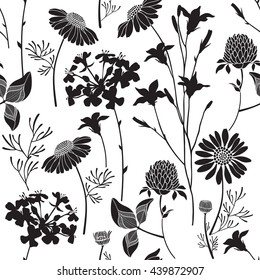 Seamless pattern with silhouettes of wild flowers on white background. Black and white vector hand-drawn illustration.