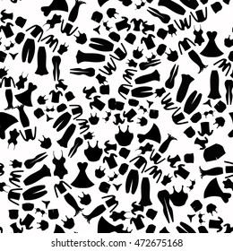 Seamless pattern with silhouettes of women's clothing vector illustration