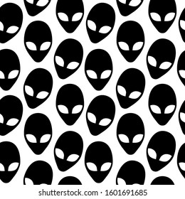 Seamless pattern with simple flat alien heads symbols. Repetitive vector illustration. EPS 10.