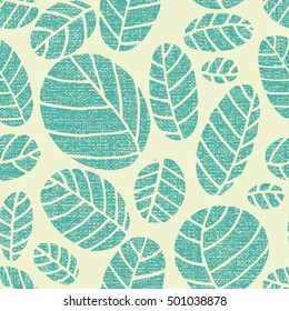 Seamless pattern with simple oval leaves decorated with handmade texture.