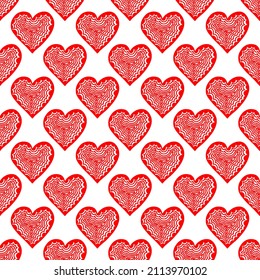 Seamless pattern of simple red hearts in doodle style