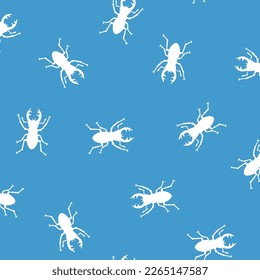 Seamless pattern with simple silhouettes of stag beetles,