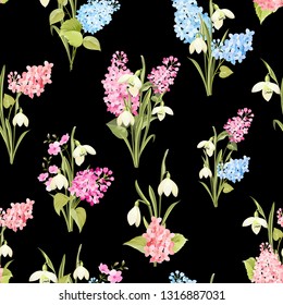 Seamless pattern of siringa and galantus flowers for fabric pattern over black background. Vector illustration.