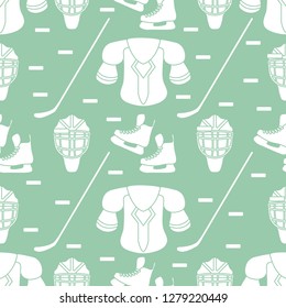 Seamless pattern with skates, goalkeeper mask, hockey stick, ice hockey puck, hockey shoulder pads. Winter sports background. Hockey equipment. Games, hobbies, entertainment.