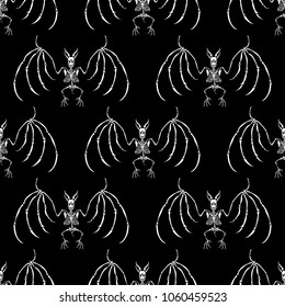 Seamless pattern. A skeleton of a bat. Isolated on a black background. Great for tattoo or print on a T-shirt. Ideal for decoration of Halloween and the Day of the Dead.