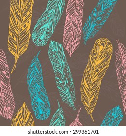 Seamless pattern with sketch style feathers in pastel color