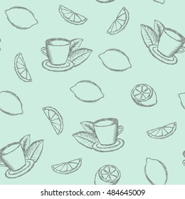 Seamless pattern sketch tea, tea leaves and a lemon, lemon slice. Green background. Graphic style. Hand drawing. Vector illustration.