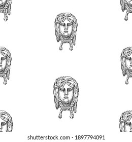 Seamless pattern from sketches ancient architectural masks in form female faces