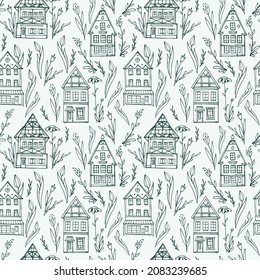 Seamless pattern with sketches of cute houses and flowers.