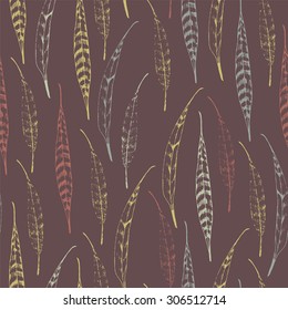 Seamless pattern with sketches pheasant feather.